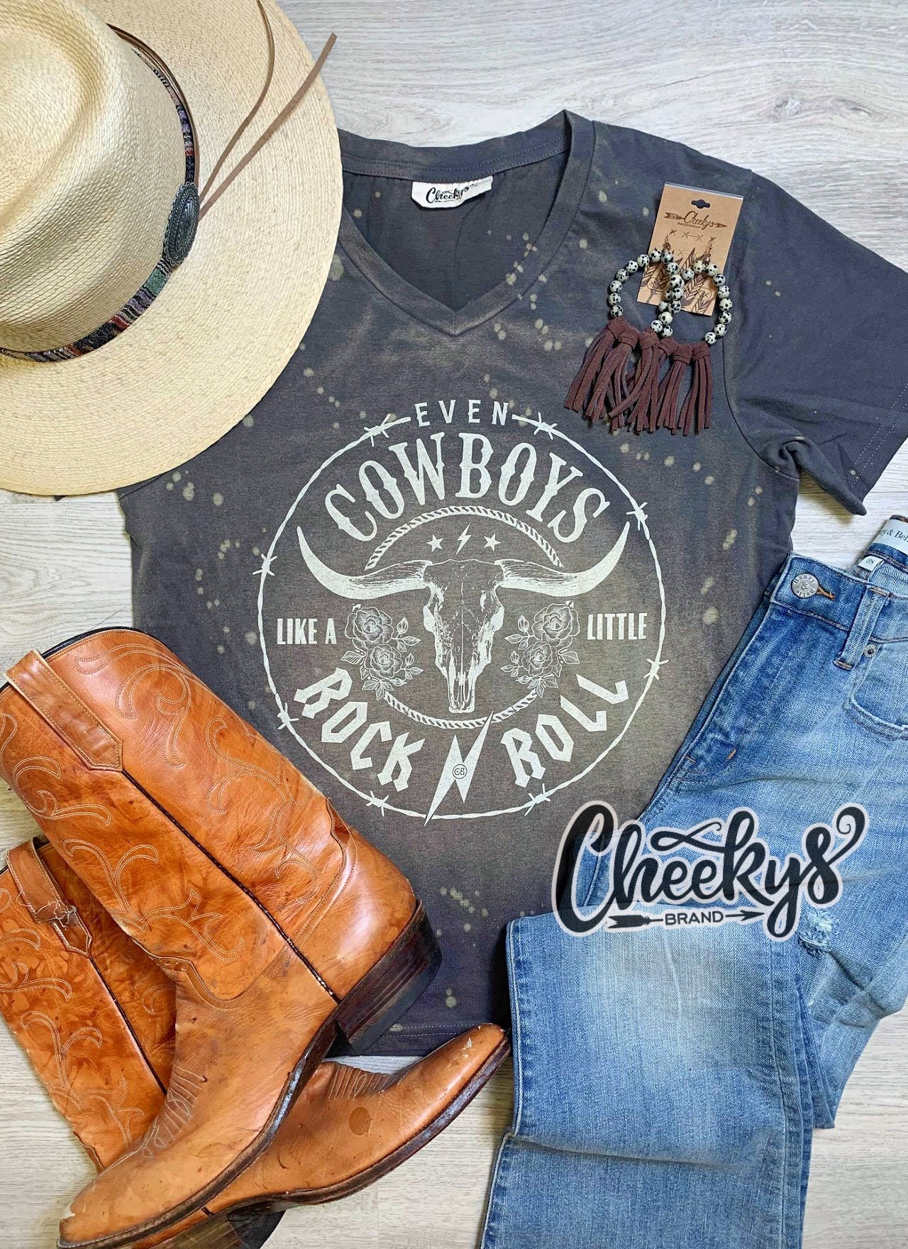 Even Cowboys Like A Little Rock N Roll V-Neck Tee On Bleached Brunette Cheekys Apparel Cheekys Brand 